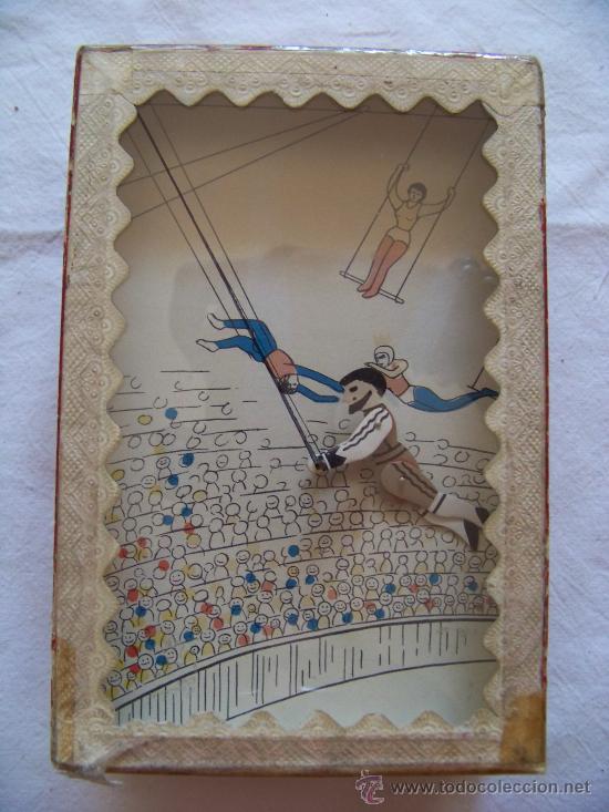 Muñeco autómata trapecista del siglo XIX